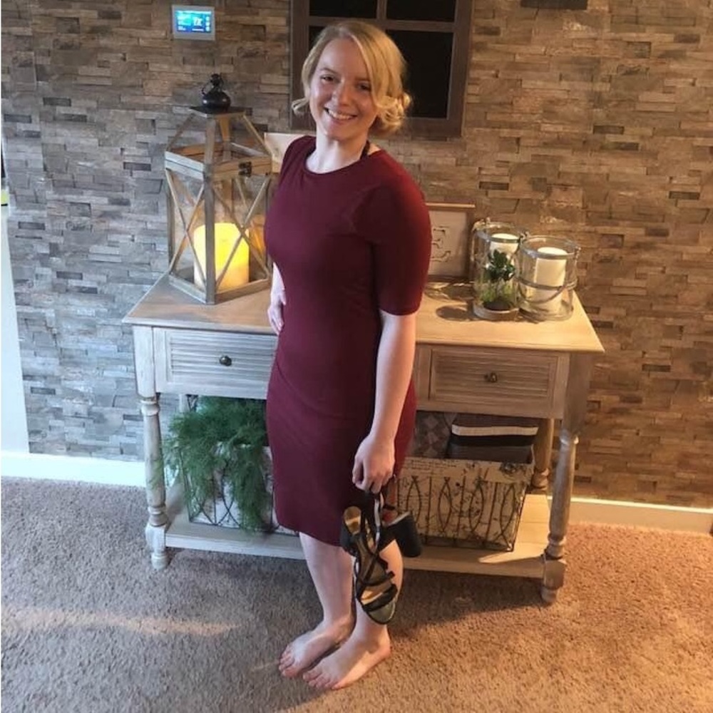 Mid form fitting maroon dress. Brand Love by Chesley